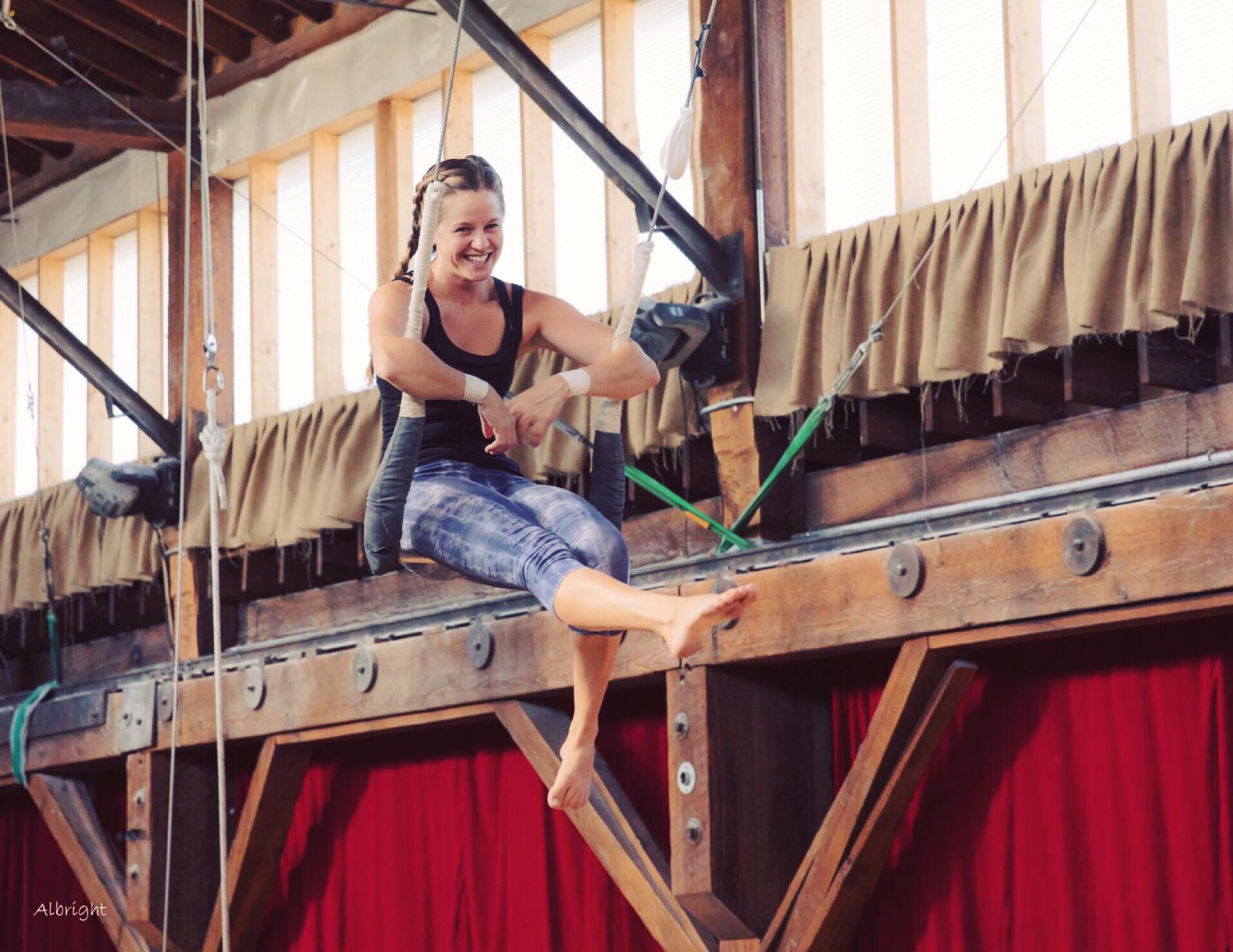 Little girl on Flying Trapeze in Seattle - Emerald City Trapeze Arts